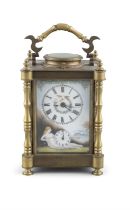 A LATE VICTORIAN BRASS CASED CARRIAGE CLOCK WITH REPEATING MOVEMENT the face and sides