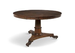 A ROSEWOOD CIRCULAR BREAKFAST TABLE, C.1830, the figured circular top on a panelled centre