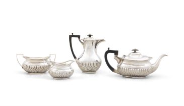 A FOUR PIECE SHEFIELD SILVER TEA SERVICE, comprising coffee pot Sheffield 1918,