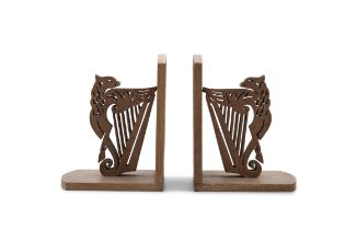 AN TÓSTAL 1953 A pair of carved wood harp book ends, each with pierced inscription 'AN TOSTAL