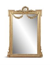A FRENCH GILTWOOD RECTANGULAR PIER MIRROR, LATE 19TH CENTURY, with outset upper corners,