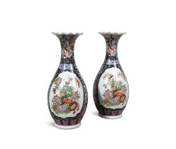 A PAIR OF JAPANESE FLORAL BALUSTER VASES 20TH CENTURY each painted with flower groups within