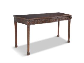 A 19TH CENTURY MAHOGANY SIDE TABLE, of serpentine form, the plain top with moulded edge,