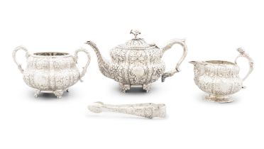 AN IRISH SILVER THREE PIECE TEA SERVICE, Dublin, c. 1823 (cream jug), c.1825 (teapot & sugar