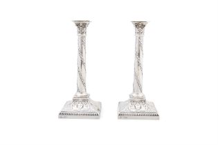 A PAIR OF VICTORIAN SILVER TABLE CANDLESTICKS London, c.1898, mark of West & Son,