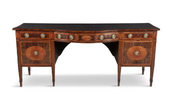 A GEORGE III INLAID MAHOGANY BOW FRONT SIDEBOARD with central dummy drawer flanked by frieze