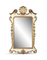 A CREAM AND PARCEL GILT PIER MIRROR in mid-Georgian style, fitted with a plain rectangular plate