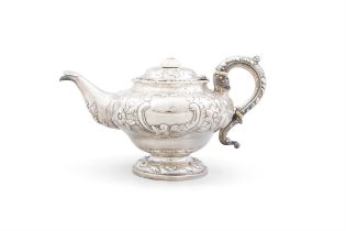 A WILLIAM IV EMBOSSED SILVER TEAPOT, LONDON, of compressed globular form, chased and embossed with