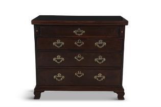 A COMPOSED GEORGE III MAHOGANY BATCHELORS CHEST of compact rectangular form, with fold over top,