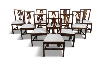 A SET OF TEN GEORGE II STYLE MAHOGANY FRAMED DINING CHAIRS, with open pierced vase splats,