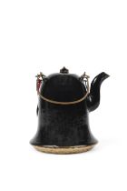 A BLACK MIRROR GLAZED PEAR-SHAPED TEA POT 清康熙 黑釉梨形茶壶 China, 18th century The bell shaped