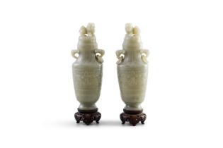 A PAIR OF JADE VASES with two wooden stands and two caps H: 21cm (excluding wooden base)