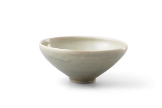 A YAOZHOU CELADON BOWL 五代 耀州窯青釉盞 China, Five Dynasties The conical bowl has an inward