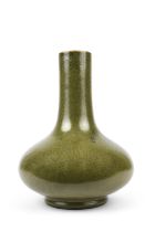 A TEADUST-GLAZED BOTTLE VASE 清代 茶葉末釉荸薺瓶 China, 19th century. H: 29.3cm