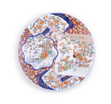 A LARGE IMARI CHARGER, Japan, Meiji period (1868-1912) of shallow circular form,