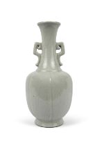 A GUAN-TYPE TWO-HANDLED VASE, MARKED QIANLONG 清代 乾隆款 仿官窯雙耳瓜棱瓶 China, 19th century.