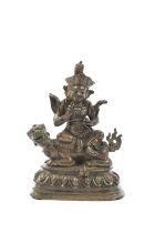 A GILT BRONZE FIGURE OF JAMBHALA 18世紀 銅泥金大威德金剛像 China, 18th century Modelled seated on the