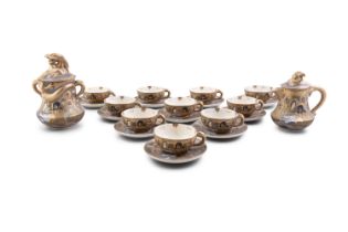 A SATSUMA EARTHENWARE TEA SERVICE Japan, Meiji Period (1868-1912) comprising a tea-pot,