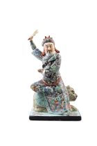 A RARE FAMILLE ROSE PORCELAIN FIGURE OF GUANDI China, mid 20th century. The seated God of War