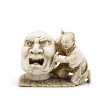 λ AN IVORY OKIMONO, Japan, Meiji period (1868-1912) Depicting a sculptor kneeling and holding