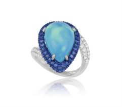 An Opal, sapphire and diamond ring The cabochon-cut, pear-shaped black opal within a round,