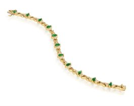 An Emerald and diamond bracelet Composed of 'X'-links set with a marquise-cut emerald,