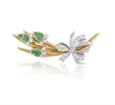 An Emerald and diamond spray brooch by Alabaster & Wilson The buds bezel-set with three