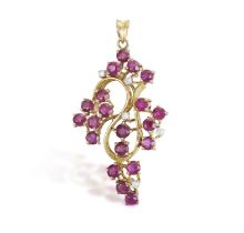 A Ruby and diamond pendant Of openwork, spray design, set with round, mixed cut rubies,