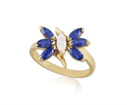 A Sapphire and diamond ring Of butterfly design, the thorax set with a marquise-cut diamond,