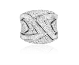 A Diamond dress ring Of concave form, the foliate design delineated by baguette-cut diamonds,
