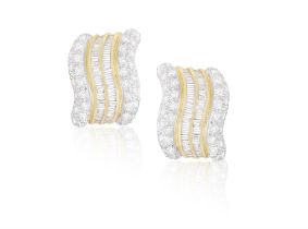 A Pair of diamond earrings Of undulating design, set with tapered baguette and round,