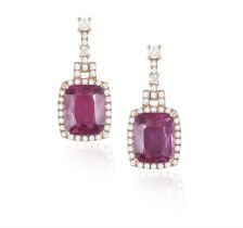 A Pair of rubellite and diamond drop earrings The cushion-shaped rubellite within a diamond-set