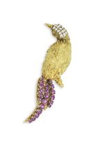 A diamond and ruby bird brooch Designed as a bird of paradise, the head prong-set with round,