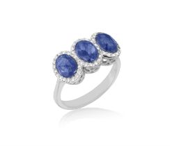 A Triple sapphire and diamond cluster ring The three oval, mixed-cut sapphires within single-cut