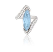 An Aquamarine and diamond dress ring The marquise-cut aquamarine within a surround pavé-set with