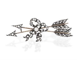 A Late 19th century diamond brooch Designed as a pair of arrows joined by a bow,
