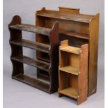 Three standing open bookcases (various sizes).