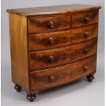 A 19th century mahogany bow-front chest fitted two short & three long graduated drawers with