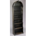 An ebonised wooden tall seven-tier standing open bookcase with a rounded top, 21” wide x 68” high.