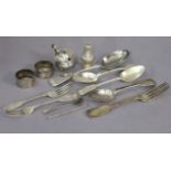 Five various silver spoons; three silver forks; two silver condiments; & two silver napkin rings.