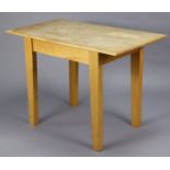 A beech kitchen table with a rectangular top, & on four square tapered legs, 39¾” wide x 28½”