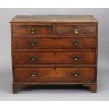 A 19th century oak chest (with replaced back, one back-foot loose) fitted two short & three long gra