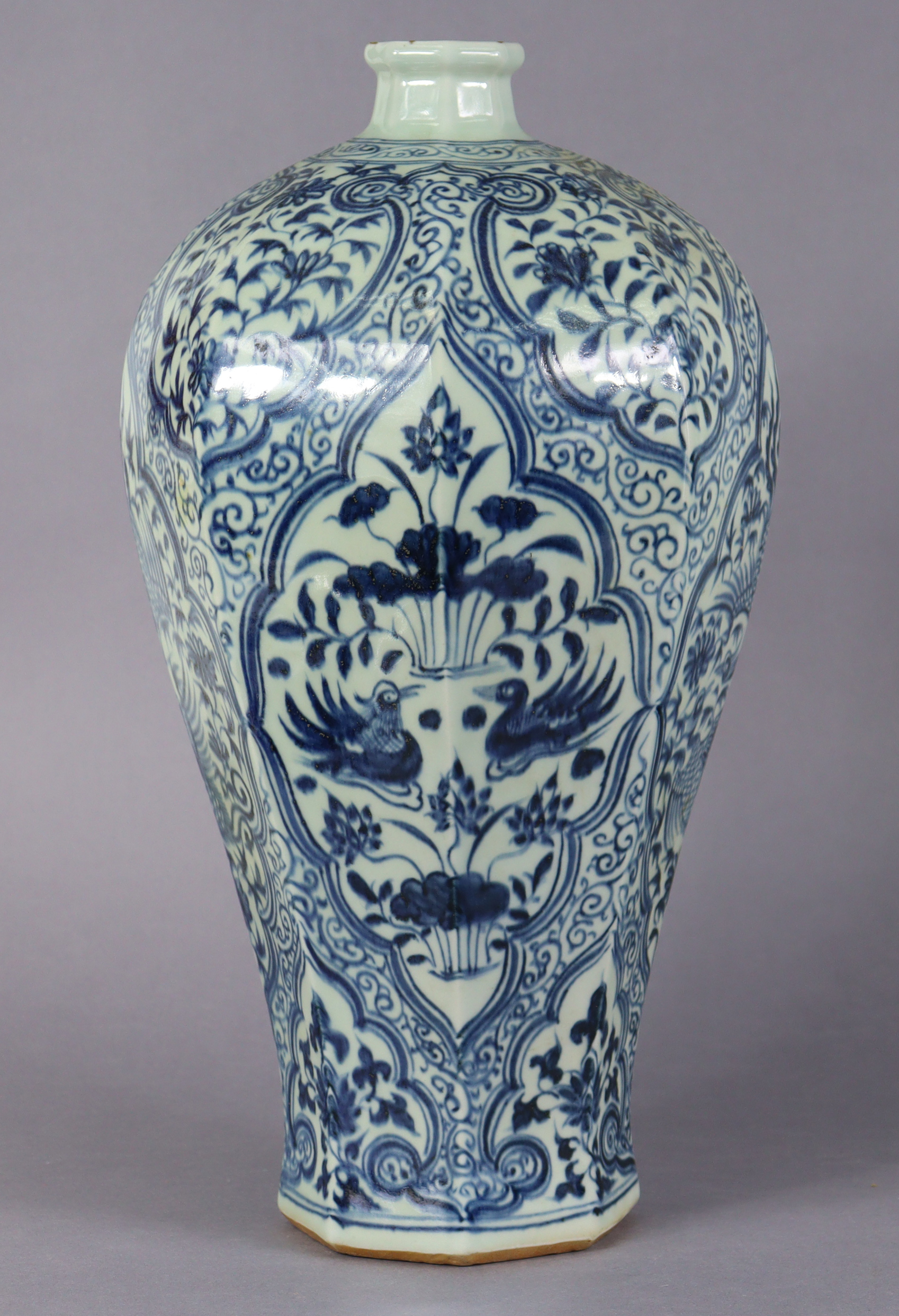 A Chinese blue & white octagonal baluster vase, decorated in the Yuan style, with short neck, 15¾”