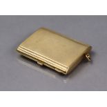 A 9ct gold engine-turned rectangular match-book case, Birmingham 1937 by B.H. Britton & Sons (38.