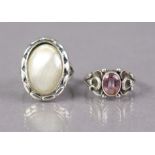 A Georg Jensen sterling ring set pink oval gemstone, size H (2.8g); & another Georg Jensen