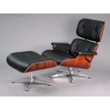 After CHARLES & RAY EAMES: A 670 LOUNGE CHAIR & OTTOMAN, with black leather upholstery & rosewood