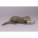 *LOT WITHDRAWN* An Austrian cold-painted bronze model of an otter, holding a fish in its mouth