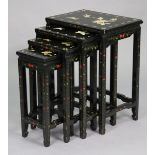 A nest of four Chinese lacquered occasional tables, each with inlaid mother-of-pearl & painted