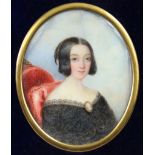 ENGLISH SCHOOL, early 19th century. A portrait miniature of a young lady (a member of the Huyshe