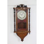 A 19th century wall clock in inlaid-walnut case, with painted dial & eight-day movement, 16” wide